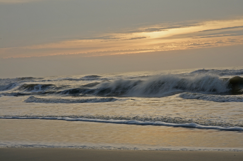 Rob Paine waves at dawn