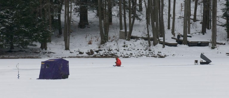 Ice fishing can be good for groups or for people seeking the quiet solitude of a frozen lake as this person experienced last winter. 