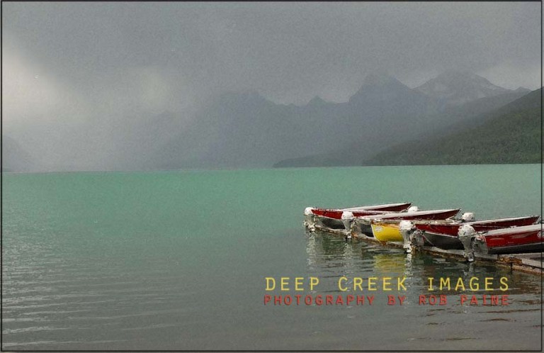 rob-paine-colored-boats-west-glacier